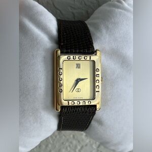 GUCCI 4000M branded square bezel, gold plated Men’s watch.